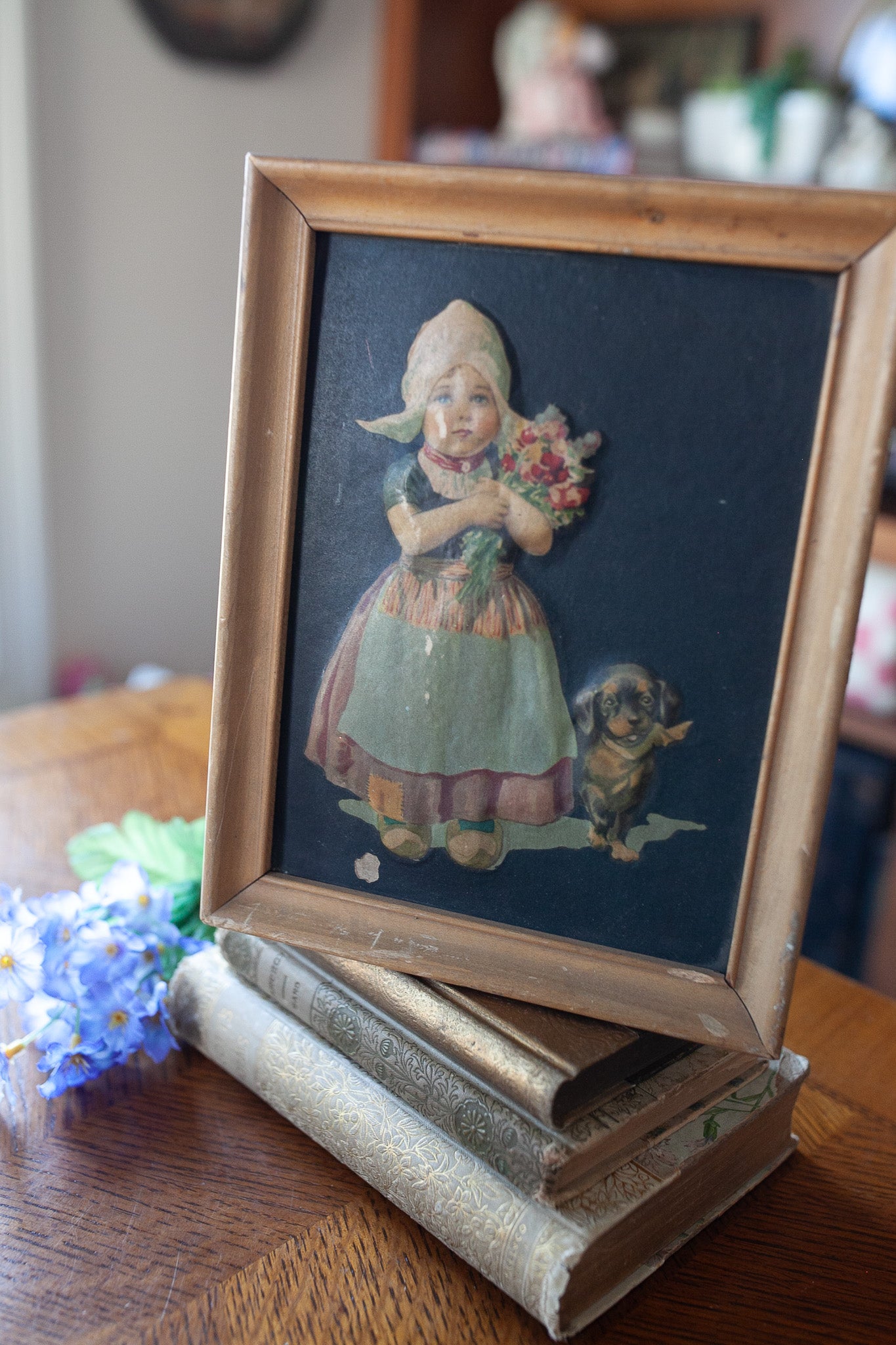 Vintage Artwork- Dutch Girl holding Flowers with her Dog