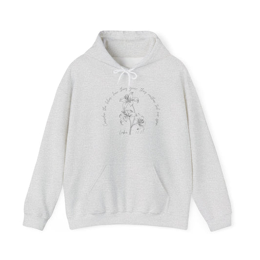 Consider the lilies, how they grow; they neither toil nor spin Luke 12:27- Unisex Heavy Blend™ Hooded Sweatshirt