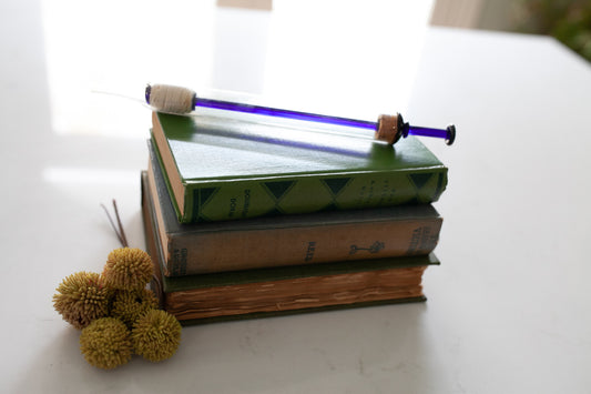 Antique glass medical syringe with blue glass plunger