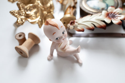 Vintage Bisque Kewpie -Kewpie Sitting