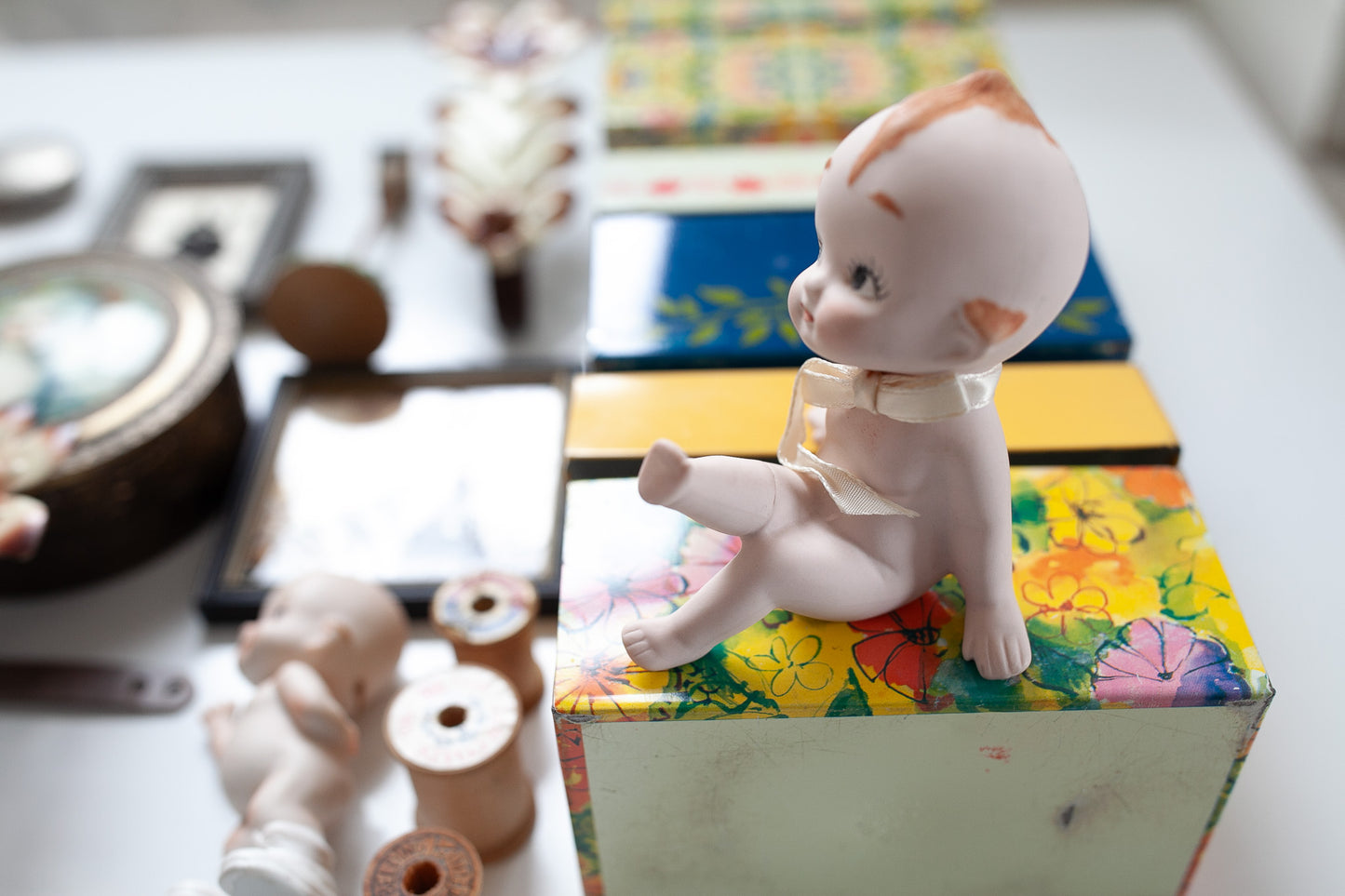 Vintage Bisque Kewpie -Kewpie Sitting