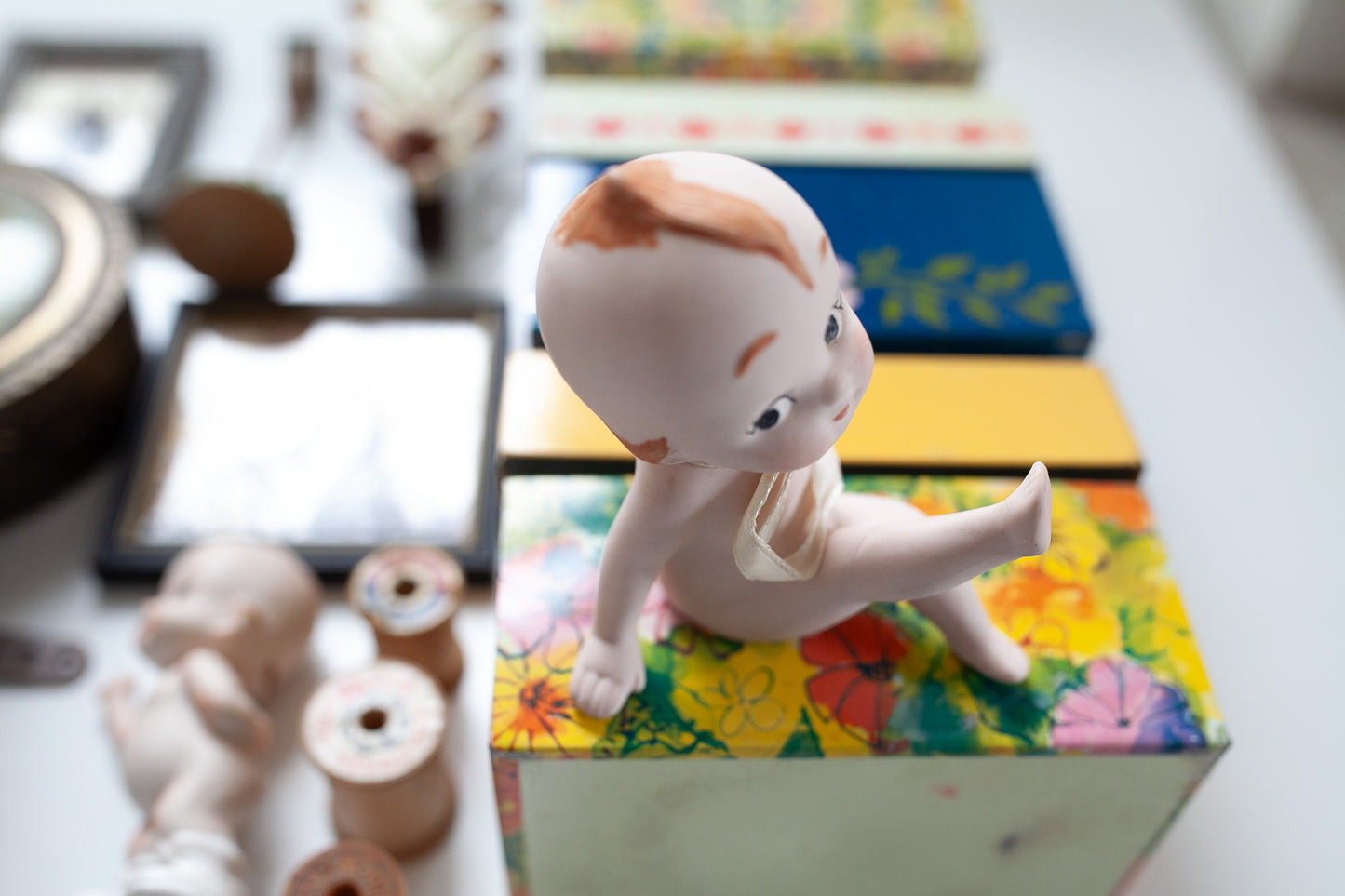 Vintage Bisque Kewpie -Kewpie Sitting