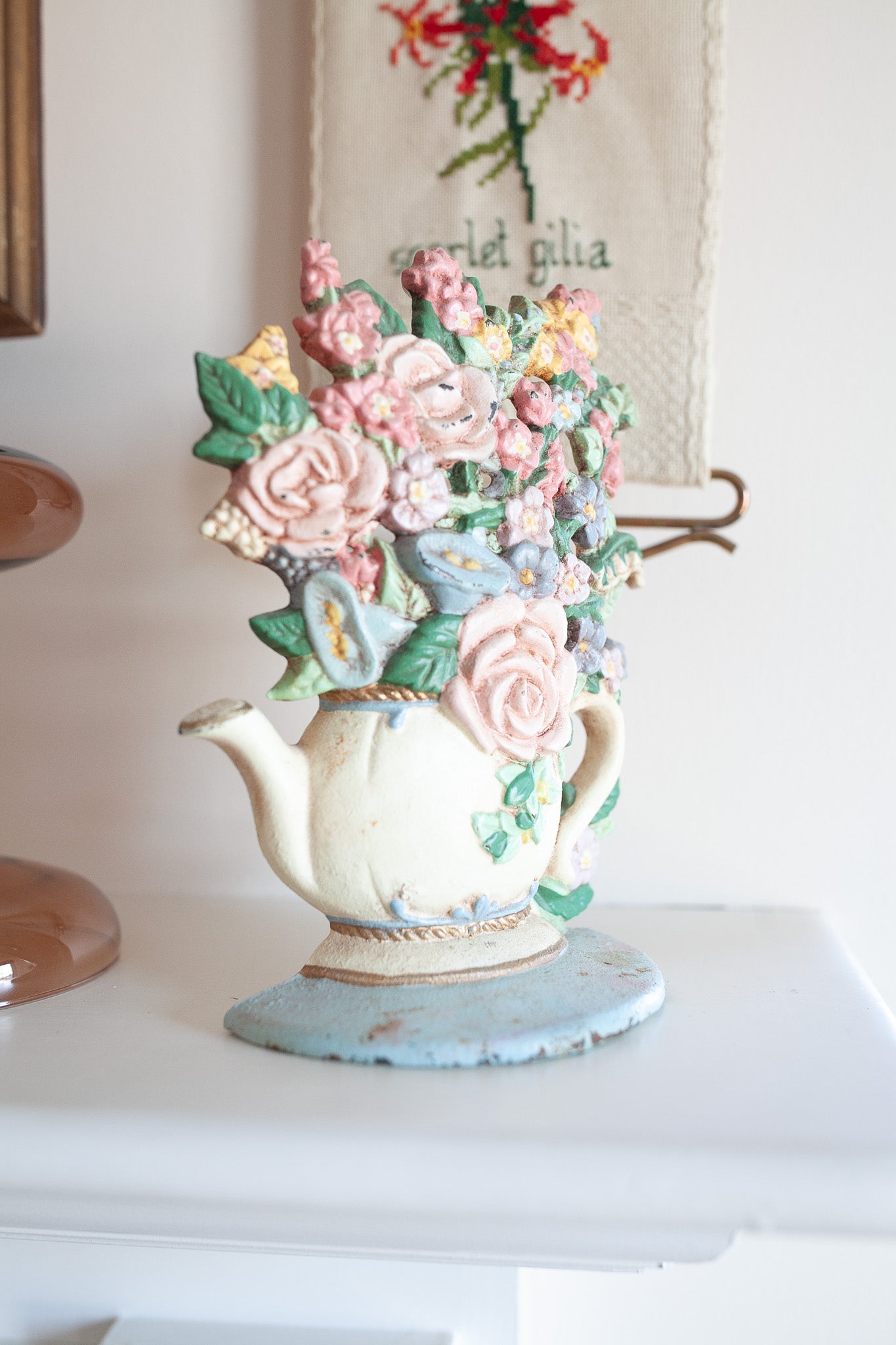 Vintage Cast Iron Flowers in Teapot Doorstop Bookend Chippy Distressed -Bookend