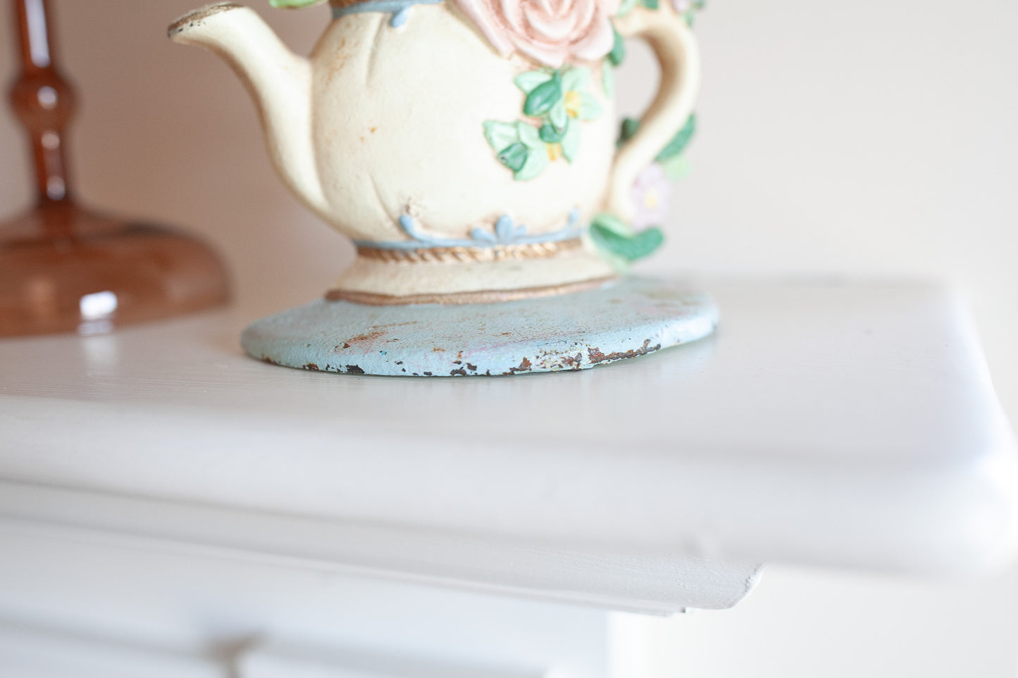 Vintage Cast Iron Flowers in Teapot Doorstop Bookend Chippy Distressed -Bookend