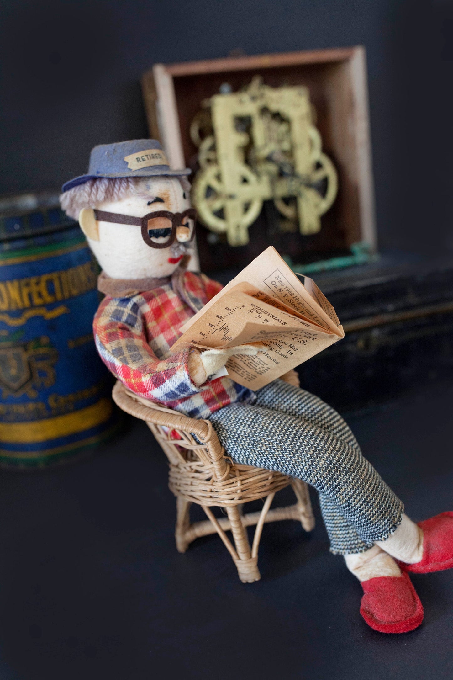 Vintage Retired Man Doll in a Wicker Chair