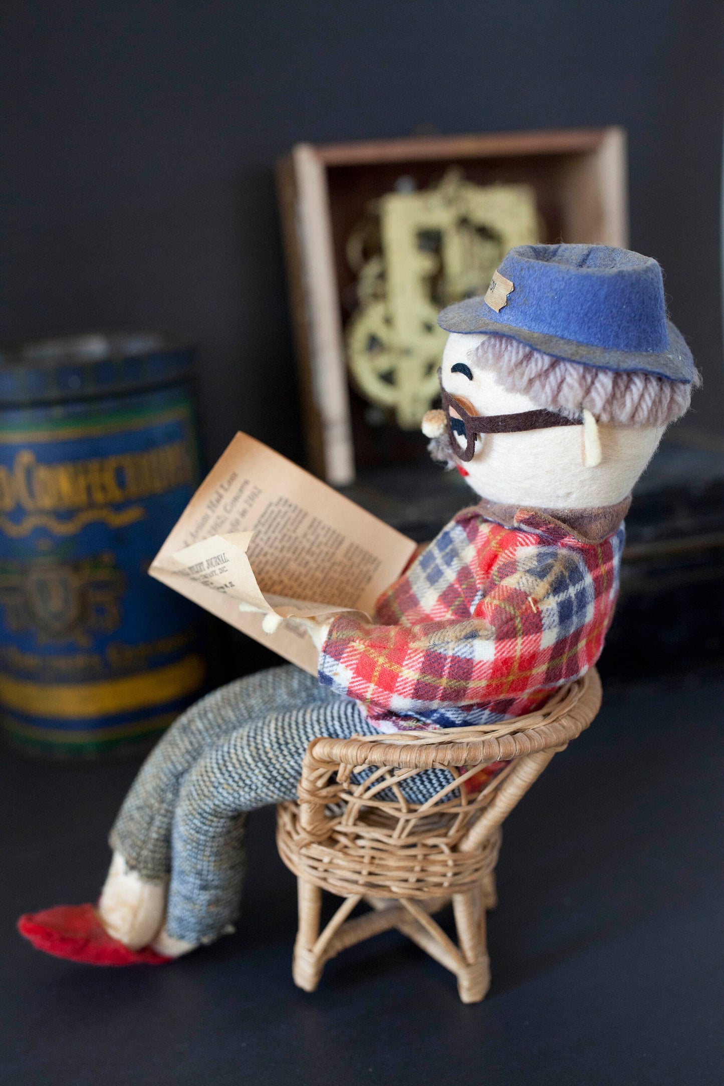 Vintage Retired Man Doll in a Wicker Chair